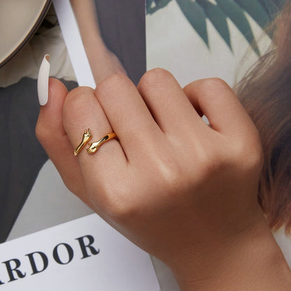 Gold plated ring with hand shape