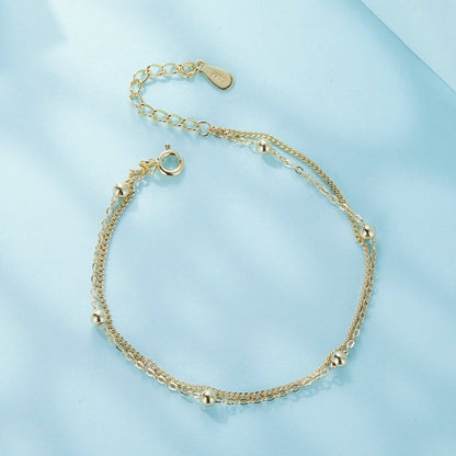 Gold plated bracelet with little beads